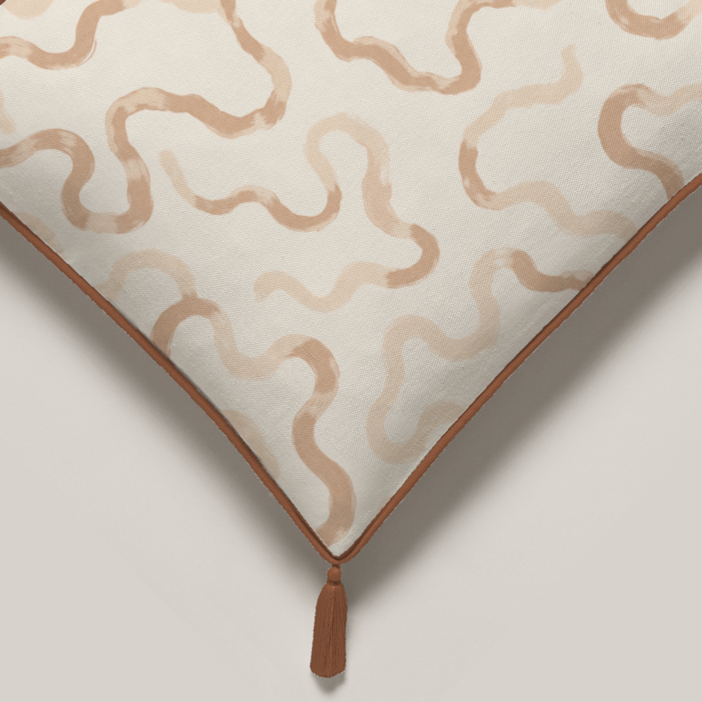 Dune Abstract Fine Cotton Piped & Tasselled Pillow Cover — 16″ Square, Camel & Chalk; printed fabric and physical finishing detail.