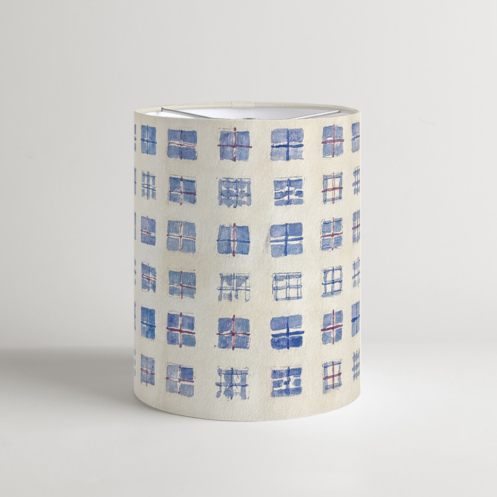 Vesper tall drum lampshade with hand-painted blue grid squares and burgundy accents on parchment.