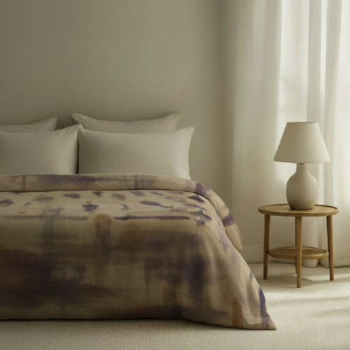 Cadenza Cotton Percale duvet cover styled on a bed; pillows, sheets, lamp and furniture are styling only.