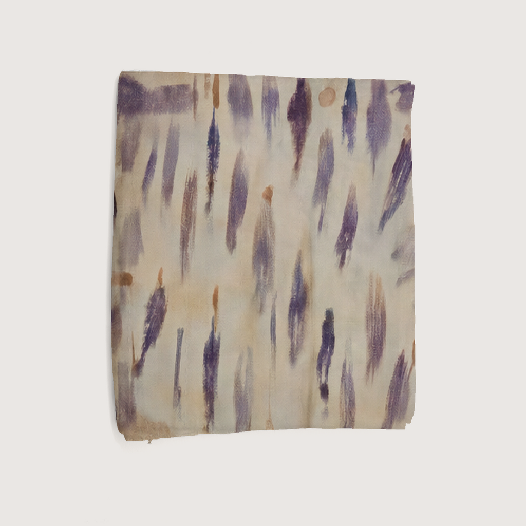 Cadenza Smooth Cotton bed runner in plum and lilac brushwork; folded view.
