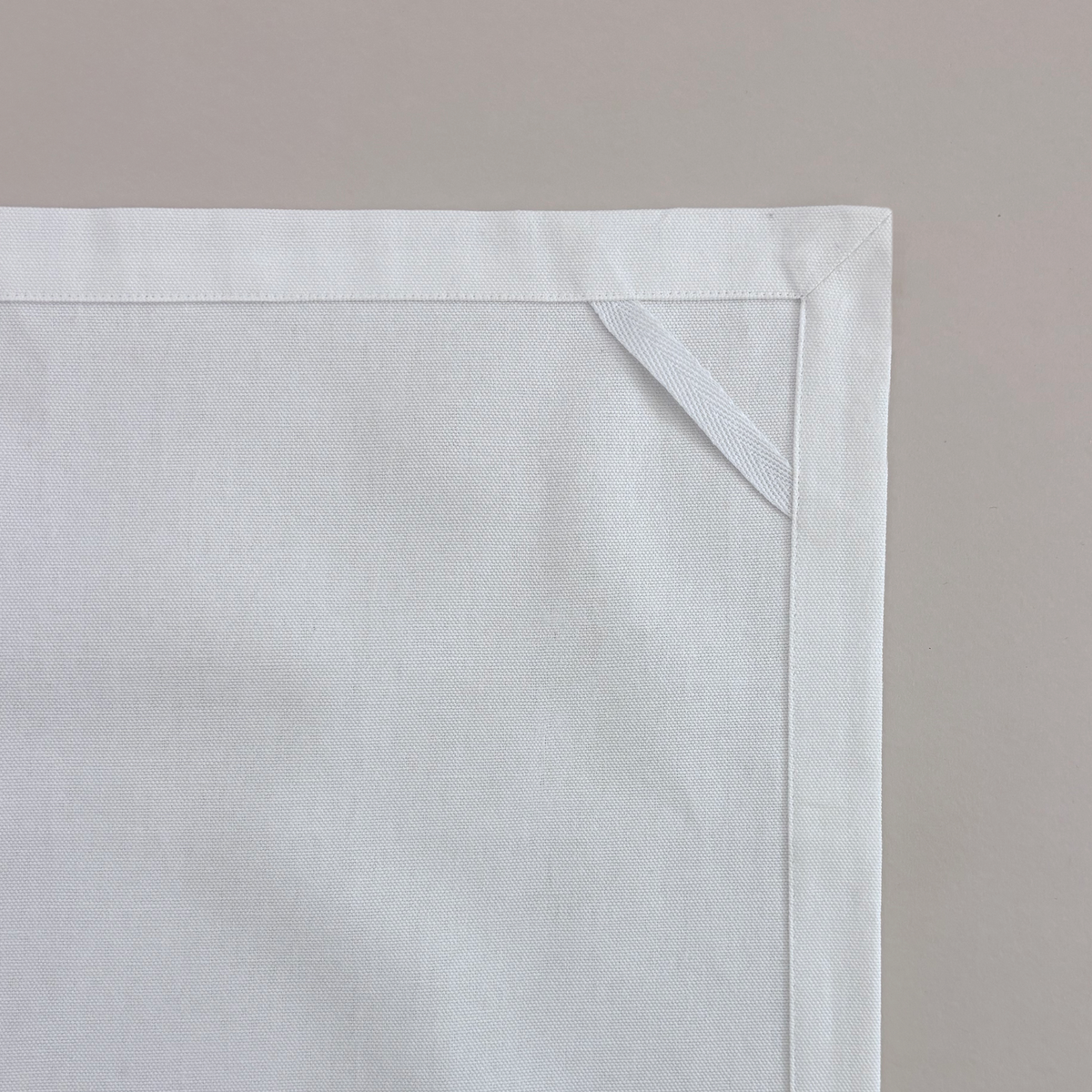 Coppice Fine Flatweave tea towels with chestnut oak leaves on parchment; sold as a set of two; plain reverse, hem and hanging loop detail.